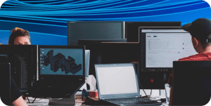 IT professionals developing a software application in a busy office