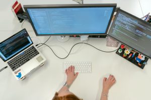 Software engineer working at her desk.